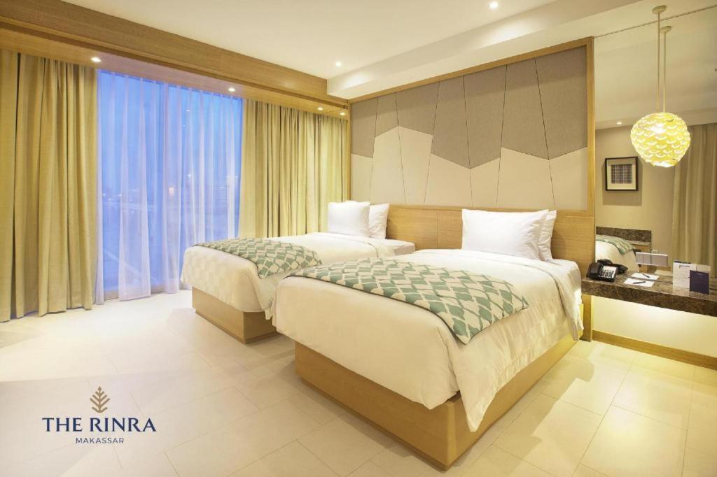 The Rinra Hotel Makassar Buitenkant foto